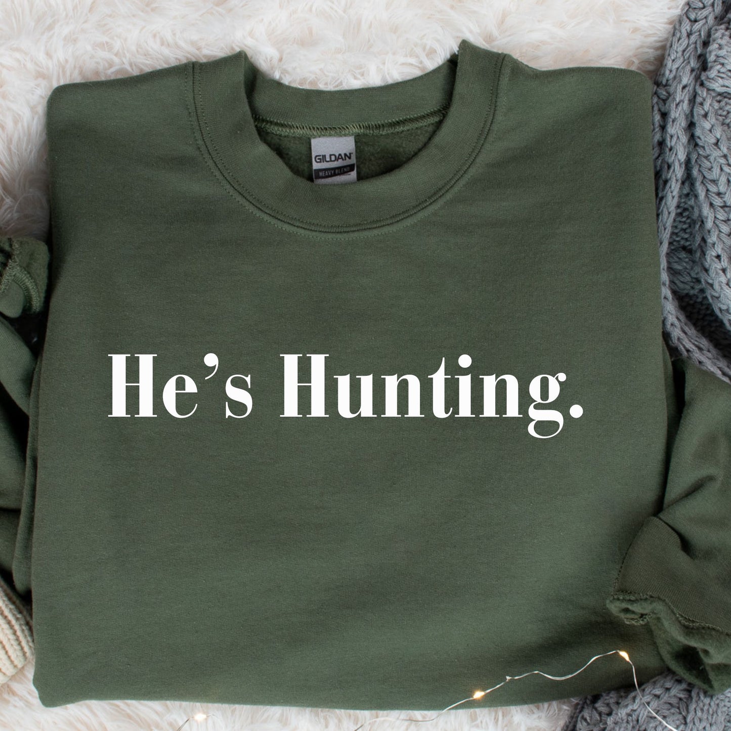 He's Hunting. Gildan Unisex Heavy Blend™ Crewneck Sweatshirt - Cozy Casual Outdoor Wear